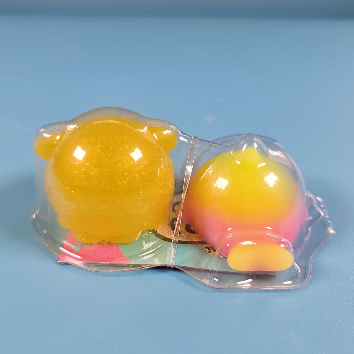 The Original Moj Moj Squish - Rainbow Dolphin & Yellow Glitter Octopus