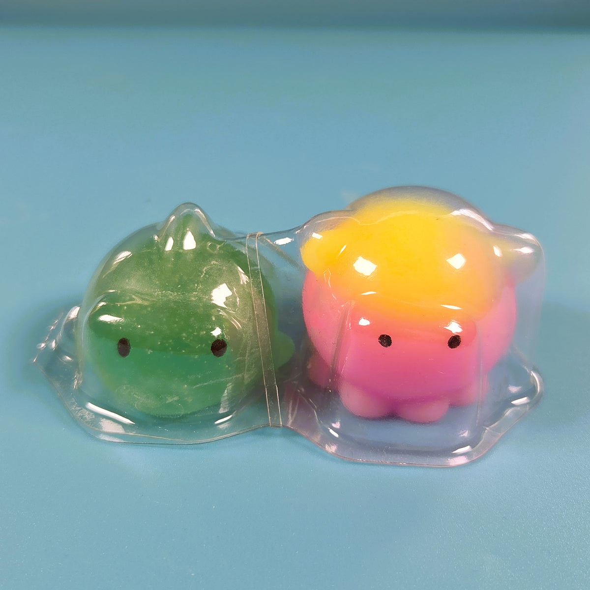 The Original Moj Moj Squish - Green Glitter Dolphin (Rare) & Rainbow Octopus