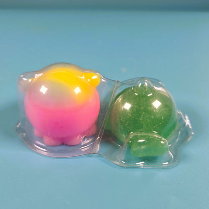 The Original Moj Moj Squish - Green Glitter Dolphin (Rare) & Rainbow Octopus