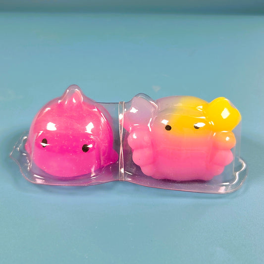 The Original Moj Moj Squish - Pink Glitter Dolphin & Rainbow Crab