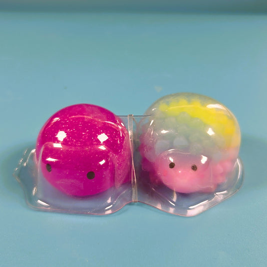 The Original Moj Moj Squish - Pink Glitter Whale (Rare) & Rainbow Sheep
