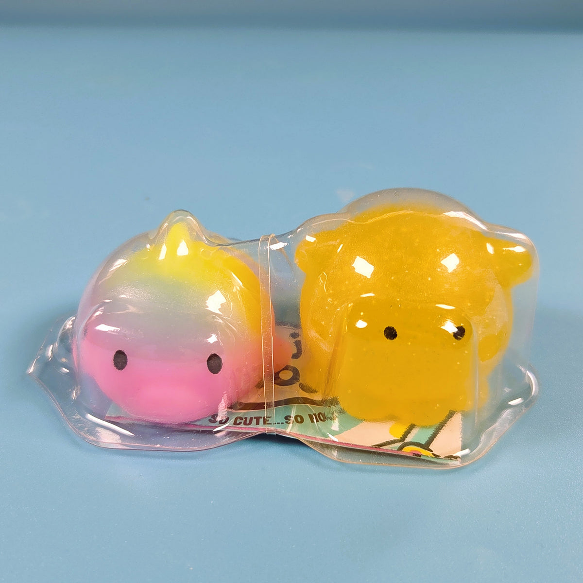 The Original Moj Moj Squish - Rainbow Dolphin & Yellow Glitter Octopus
